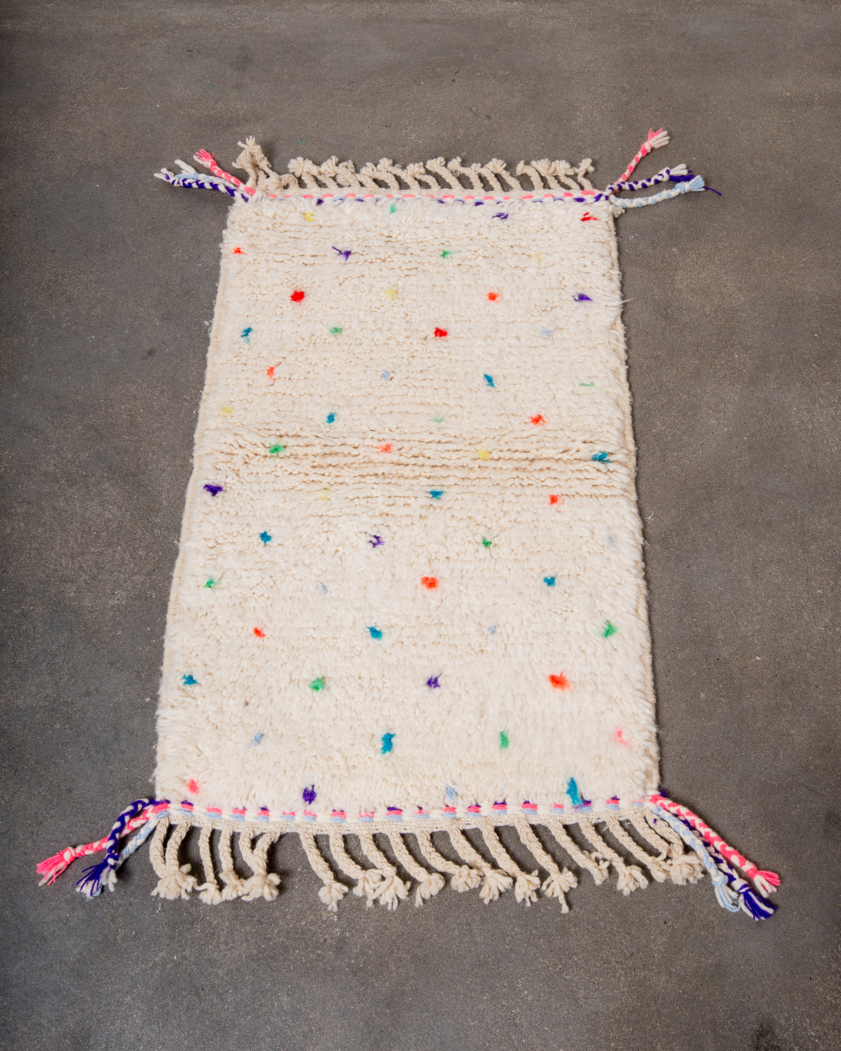 Modern, designer, handcrafted Berber rug from Morocco. Beniourain carpet with beautiful colours and patterns and fluffy wool texture.